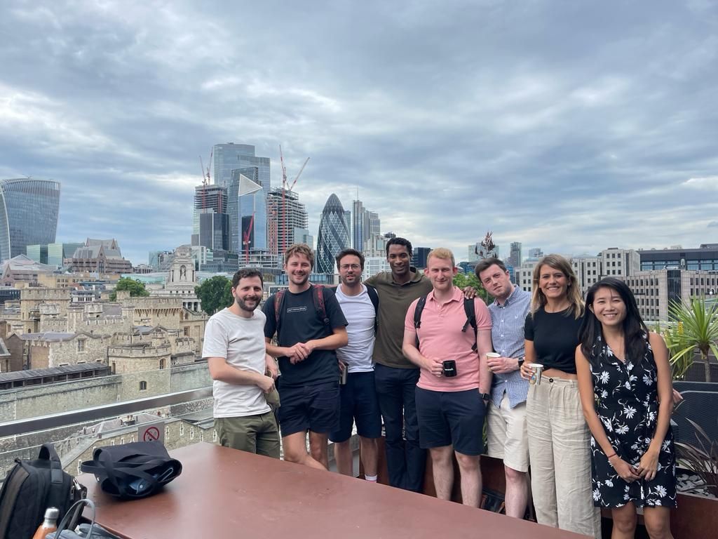 group photo with London skyline